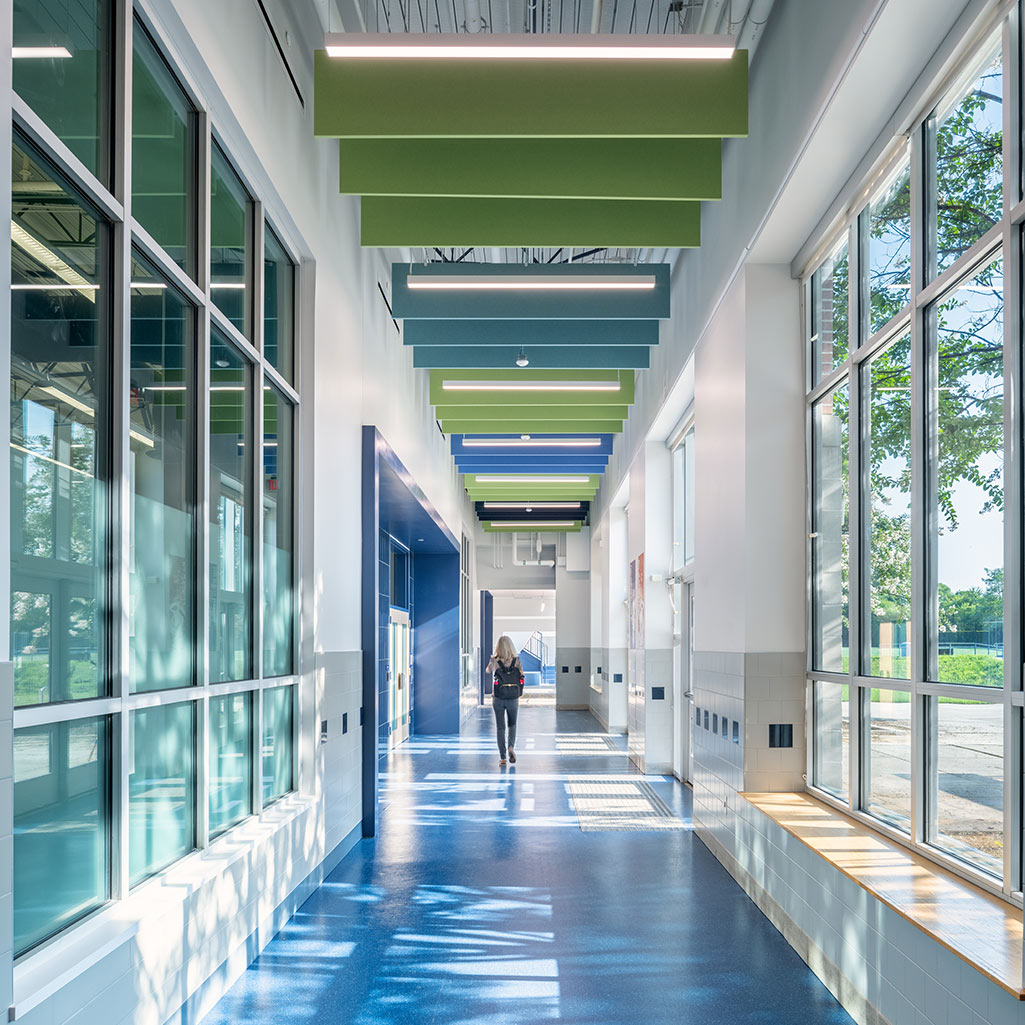 Interior view of a hallway with modern, colorful design.